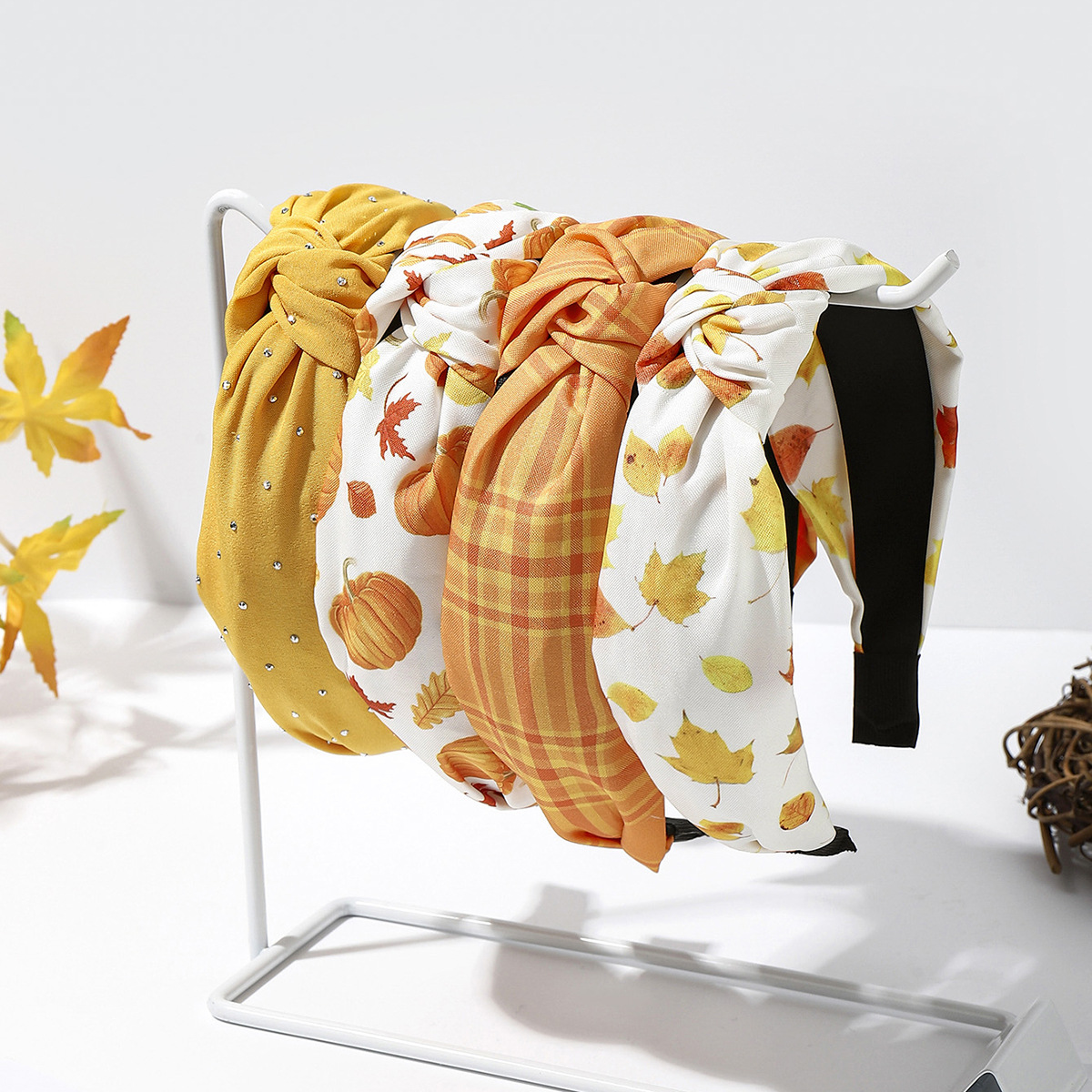 Wholesale Fabric Thanksgiving-themed headband with maple leaf, turkey, pumpkin, and mushroom prints - a stylish holiday hair aessory set (4 pieces).