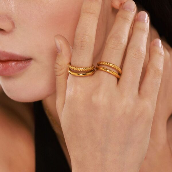 Wholesale Oumika Minimalist Twist Double Opening Ring Stainless Steel Plated 18k Gold Color Preservation Finger Ring in stock