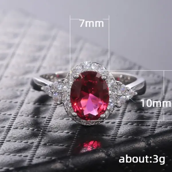 Wholesale Classic Fashion Copper Inlaid Red Zircon Oval Ring