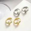 Wholesale 1 Pair Simple Style Streetwear Commute Devil's Eye Plating Inlay Copper Zircon 18k Gold Plated Earrings