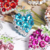 oly-7ab6b4bed0991f1fbf645ffeedf4fd67 Wholesale DIY colorful grape-shaped keychain with full rhinestones and straight holes for easy stringing.