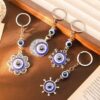 Wholesale Cross-border Explosions Devil's Eye Blue Eyes Keychain Retro Compass Moon Snowflake Pendant Backpack Pendant Accessories