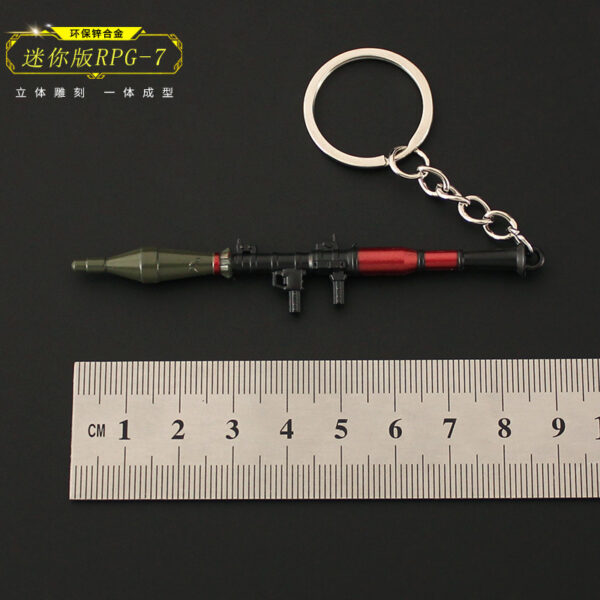 oly-7b451c932fe54ab77d422169d5a2488e Wholesale Heping elite peripheral metal chicken pendant RPG mini rocket launcher alloy keychain 9cm