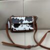 oly-7b60293a51d89aa9f231f8473975bebe Wholesale in stock Retro Solid Color Dairy Pattern All-match Shoulder Bag Crossbody Bag Mobile Phone Bag Card Slot Adjustable
