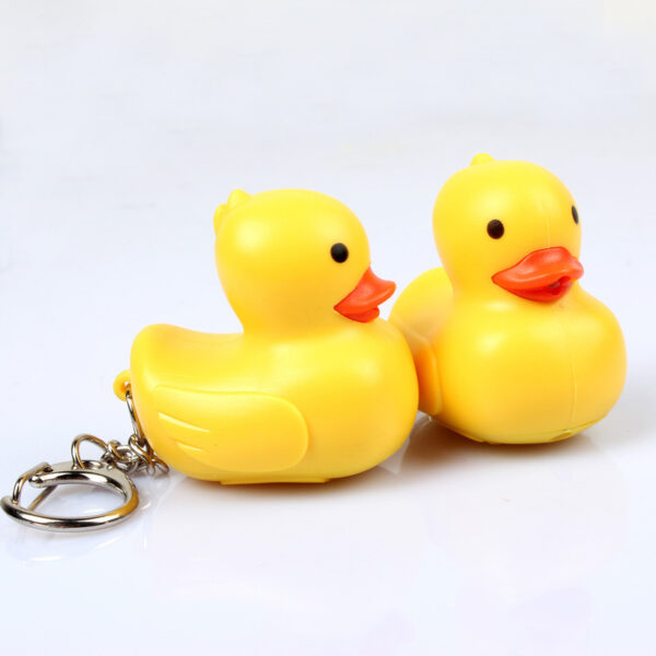 Wholesale In stock cute cartoon duck car keychain LED luminous sound creative electronic toy small gift bag ornaments
