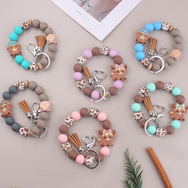 Wholesale New Cartoon Cow Consumption Silicone Bracelet Keychain Creative DIY Silicone Handmade Beaded Bracelet Women's Jewelry