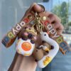 oly-7c77024e4467f078c91e150a66b171d2 Wholesale Lovable Keychain Stereo Doll Bag Pendant OLY Exclusive