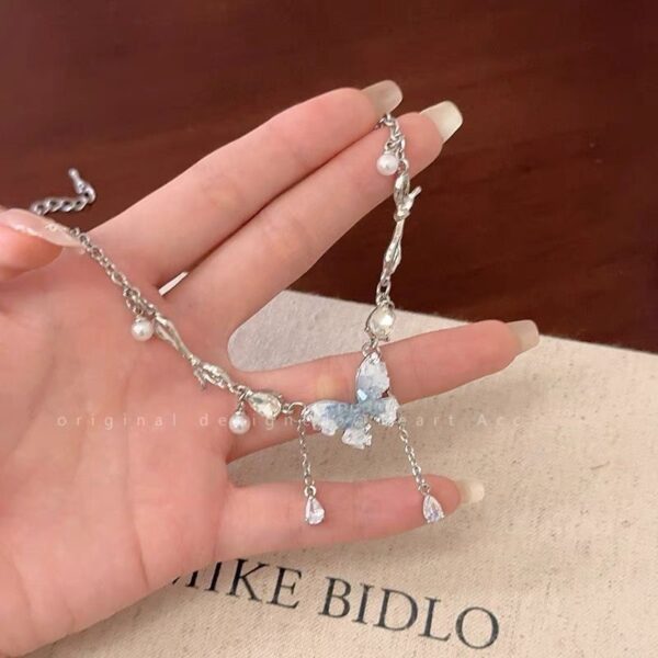 oly-7ca2a2201665c3156b3d98061e31b4ca Wholesale Ice Crystal Gradient Pearl Butterfly Tassel Necklace Women's Ins Summer Exquisite High-grade Clavicle Chain Sweet Cool Girl Necklace