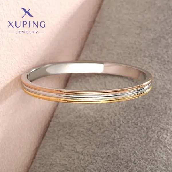 Wholesale Elegant XUPING Simple Style Color Block 304 Stainless Steel 18K Gold Plated Raw Steel Bangle In Bulk