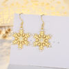 Wholesale Large gold-tone earrings with micro-embellished snowflakes