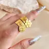 Wholesale PVD Coated Real Gold Plated 18K Gold Eye Solid Color Flower 304 Stainless Steel Tropical Simple Style Waterproof Non Tarnish Charm Rings