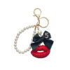 Wholesale New clay lips pearl chain car key chain pendant creative Korean bow bag ornaments women's cross-border