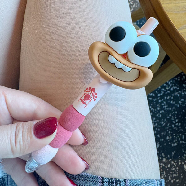 oly-7fb66503b1d5c24893703424817adb3f Wholesale Cute big-mouthed, big-eyed funny doll black click gel pen