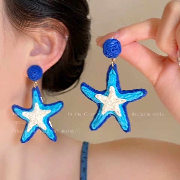 Wholesale [Holiday Island] Seaside Holiday Style Straw Suower Earrings Personality Elegant Skinny All-match Western Style Earrings