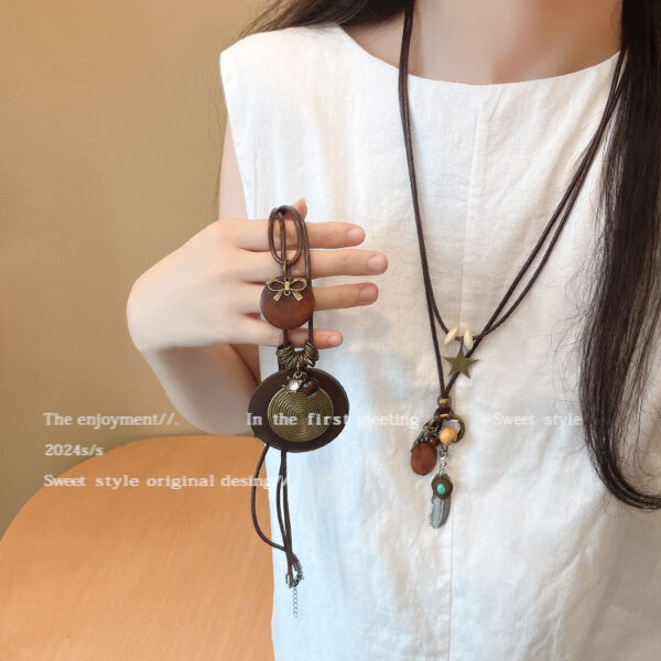 oly-811cb293ea05f4ba1046e332d6acaea3 Wholesale Zen Retro Feather Necklace Women's Ethnic Style Overlapping Beaded Clavicle Chain Long Bohemian Matching