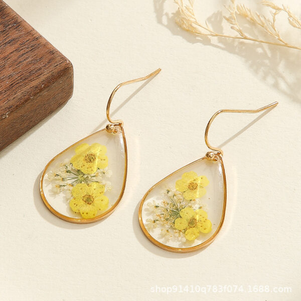 oly-813b24f7186ebefd12835ca77f60f8c8 Wholesale New Transparent Camellia Dried Flower Creative Water Drop Flower Earrings Design Earrings