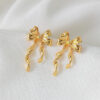 oly-81604f86e7c2f8998b8e9b98d0941664 Wholesale European and American Cross-Border Hot-Selling Environmentally Friendly Alloy Gold Bow Personalized Fashion Trend Earrings Earrings Design Niche