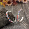 Wholesale C-shaped acrylic blue, white, and red striped alloy vintage earrings