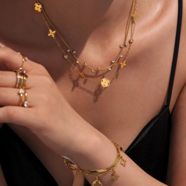 Wholesale Enigma 5A Round Bead Zircon Hollow Lucky Four-leaf Flower Overlapped Necklace Women's 18K Gold Plating Accessories Necklace Chain