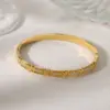 Wholesale Casual Classic Style Commute Heart Shape Solid Color 304 Stainless Steel 18K Gold Plated Zircon Bangle In Bulk