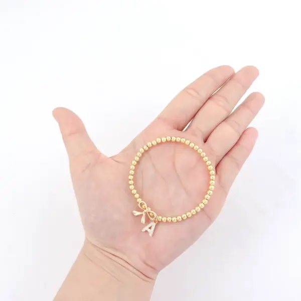 Wholesale PVD Coated Real Gold Plated Letter Bow Knot 201 Stainless Steel 304 Stainless Steel Elegant Simple Style Classic Style Waterproof Non Tarnish 201 Stainless Steel Bracelets