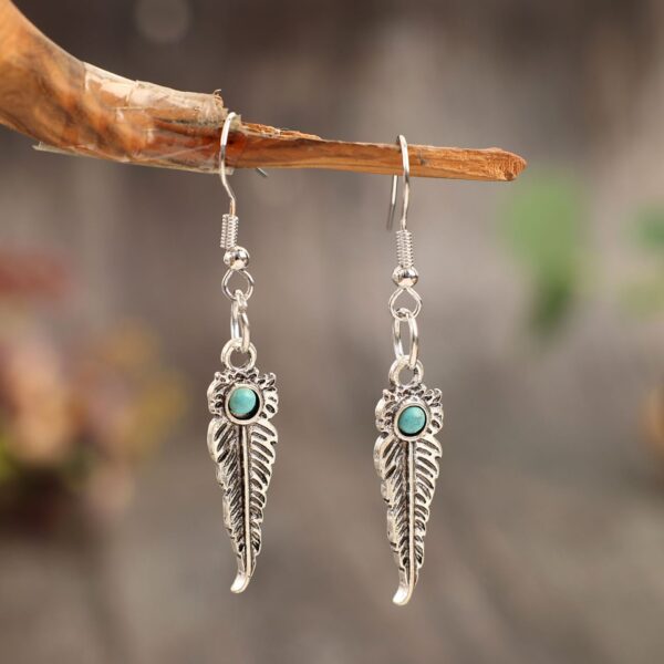 oly-83b26332b3dddcc708b97508a6427ca0 Wholesale New Retro Alloy Blue Turquoise Horn Earrings European and American Western Cowboy Creative Bull Head Earrings