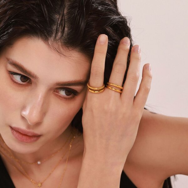 Wholesale Oumika Minimalist Twist Double Opening Ring Stainless Steel Plated 18k Gold Color Preservation Finger Ring in stock