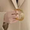 Wholesale Ion Plating (IP) 18K Gold Plated Curve 304 Stainless Steel Simple Style Waterproof Non Tarnish 304 Stainless Steel Bangle