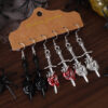 Wholesale Amazon's best-selling Halloween Sword Piercing Heart Earring Set - Retro Gothic Skull Earrings