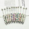 Wholesale DIY cute star moon beaded pen colorful full diamond bead ball pen cross-border explosions cute grain pen