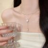 Wholesale Early Spring Accessories Pearl Necklace Simple and High-End Double-Layer Stacked Halter Camellia Sweater Chain Women's Clavicle Chain