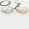 Wholesale 18K Gold Plated Copper Vacuum Plating Zircon Waves Crown Classic Style Open Ring For Women'S