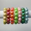 oly-854c4d6b55d6a44ef43137bfe19609de Wholesale Color-blocked laser beaded resin bracelet
