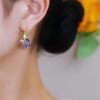 oly-85d7ece9c86510eaa38a18f0f9efef21 Wholesale Purple Crystal Ear Buckle Women's Exquisite Light Luxury Fashion Earrings Fashion High-end Sense Spring and Summer Earrings
