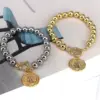 Wholesale Copper Beaded Plating Round Virgin Mary Bracelets