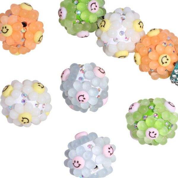 oly-867c7ae9257e7237c09851ca520ce19f Wholesale Smiley sunflower beads can be strung with straight holes to make DIY phone keychains and jewelry.