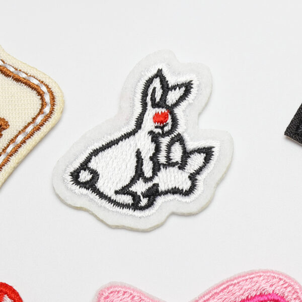 Wholesale Elegant embroidery computer embroidery stickers cute rabbit round badge English letter series clothing bag decorative cloth stickers