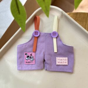 Purple floppy cat overalls