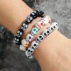 oly-872ccdc1c937197756752352aeeb77a8 Wholesale Dark Style Hand Ornaments Personalized Skull Beaded Bracelets Skull Hand Web Bracelets Trendy