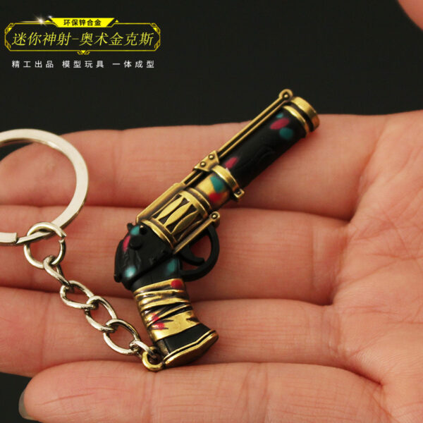 oly-876e22c55b410cbb4a892fbe897daa14 Wholesale Fearless contract peripheral God shooting arcane jinks model mini double city battle Justice alloy keychain pendant