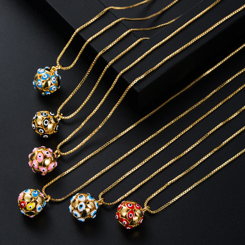 Wholesale copper plated real gold op oil eye pendant women's fashion geometric spherical necklace Devil's Eye necklace