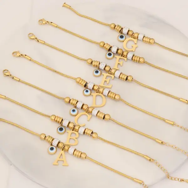 Wholesale 304 Stainless Steel Copper 18K Gold Plated Retro Commute Inlay Letter Eye Rhinestones Bracelets