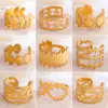 Wholesale Vacuum Plating 18K Gold Plated 18K Gold Cross Round 201 Stainless Steel Simple Style Roman Style Open Rings