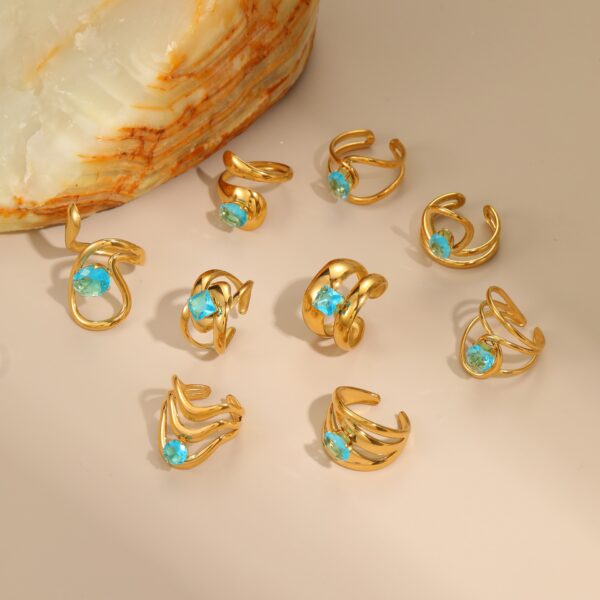 Wholesale Openwork irregular blue zircon stainless steel ring with gold plating