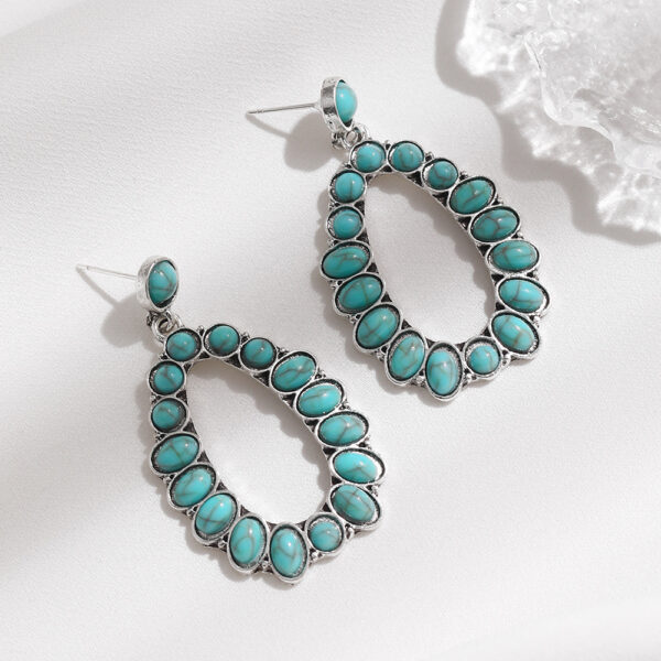 oly-8929970fb2fee2eb51d1dad995281b57 Wholesale Europe and the United States exaggerated earrings retro oval turquoise drop hollow earrings earrings foreign trade jewelry