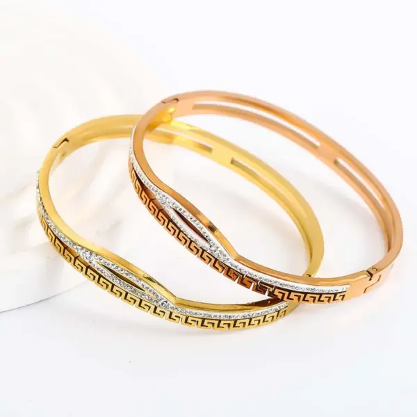 Wholesale Geometric Bangle For Women In Golden Titanium Steel With Electroplated Finish And Rhinestone Inlay