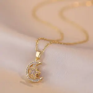 X2038 Star and Moon Rotating Necklace