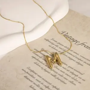 Gold / Letter M