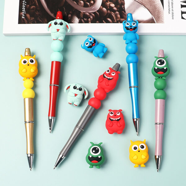 oly-899376c50e405a14d3465c95b548b6c6 Wholesale Cute Monster Silicone Beads