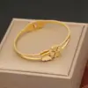 Wholesale PVD Coated 18K Gold Real Gold Plated Devil'S Eye Stainless Steel Vintage Style Luxurious Waterproof Non Tarnish 304 Stainless Steel Bangle